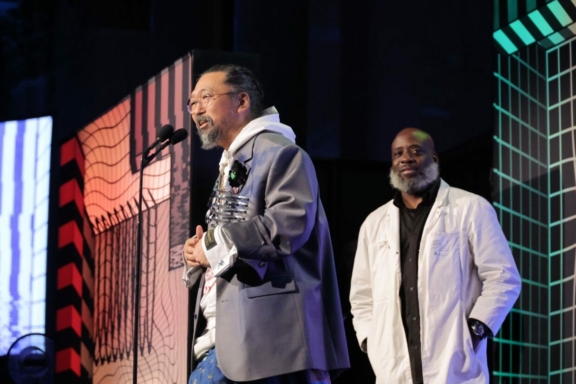Takashi Murakami giving his 5-Word Speech as he accepts a Webby Special Achievement at the 26th Annual Webby Awards. (via Webby Awards)