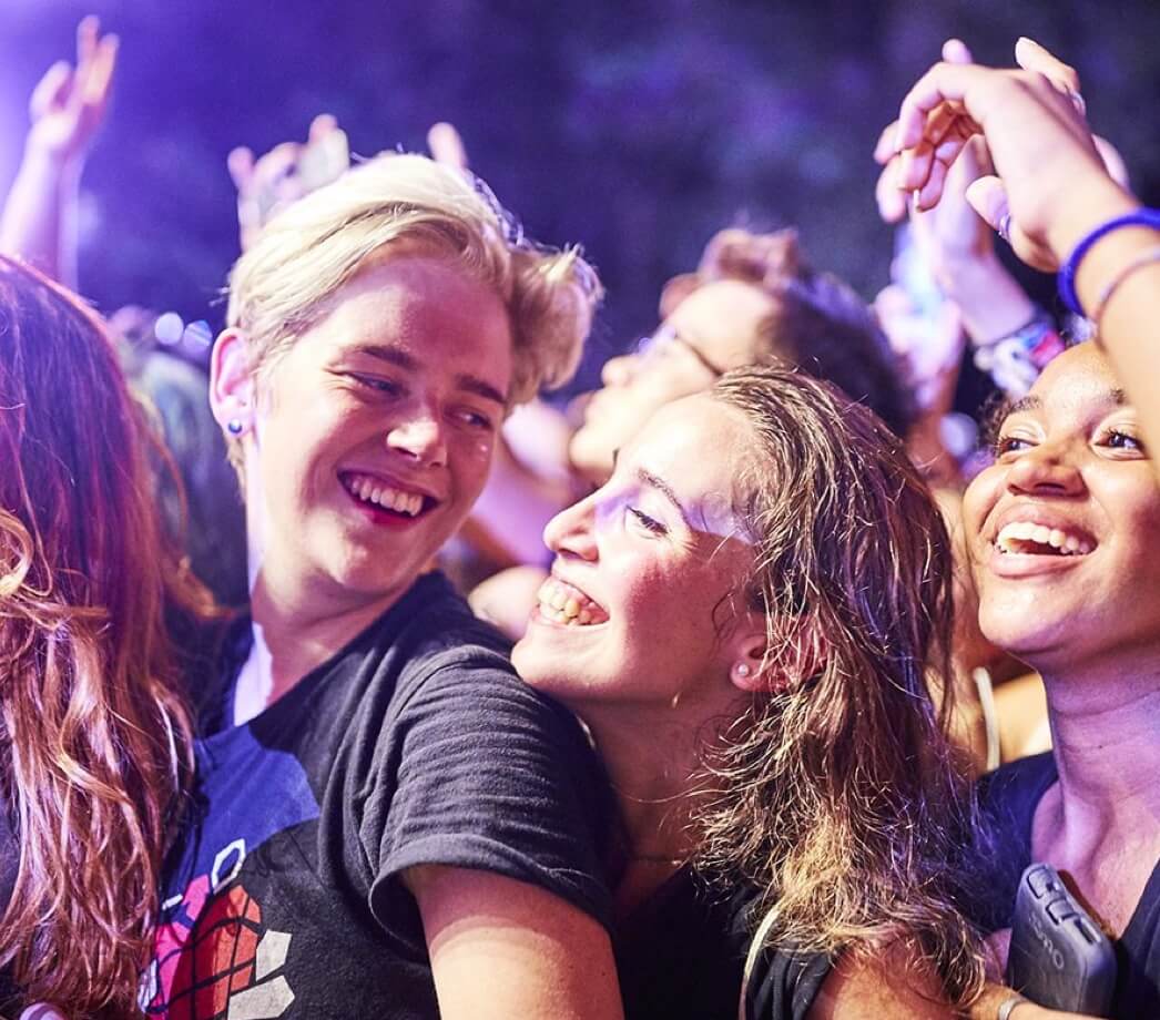 Global Citizen smiling audience members
